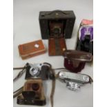 Kodak cartridge bellows camera and three other cameras and a View Master