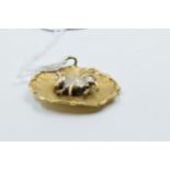 9ct Two colour gold Taurus the bull zodiac pendant, 16g