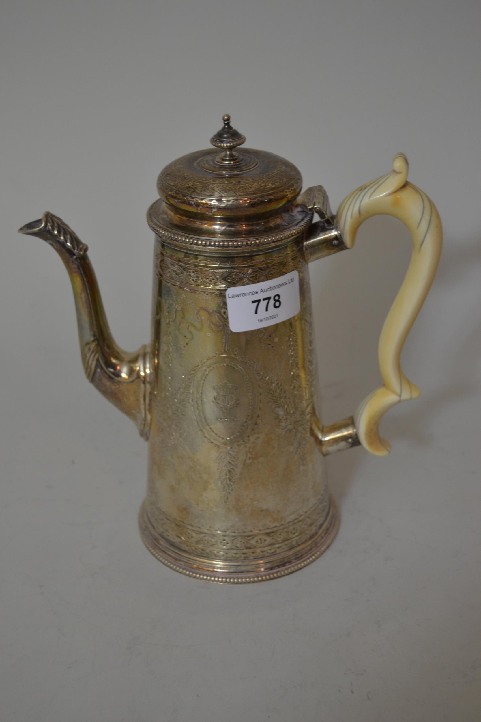 Victorian silver coffee pot in Georgian style, the plain tapering body engraved with swags and bows,