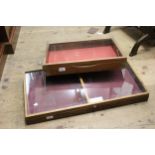 Two mahogany table top display cases with hinged glazed covers, 21ins x 16ins and 21ins x 12ins