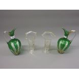 Pair of Victorian green glass jug vases decorated with lily of the valley, together with two other