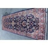 Sarouk Mahal rug with floral design on blue ground with borders, 3.6m x 1.2m