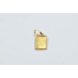 1g Fine gold ingot form pendant Excellent condition, no damage or repair Mount marked 750 1.5g gross