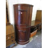 Victorian mahogany standing corner cabinet with two bow doors on a plinth base (converted from
