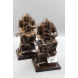 Pair of reproduction bronze patinated bookends in the form of monkeys reading from books