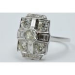 Large platinum cluster ring set brilliant and baguette cut diamonds, total weight approximately 1.