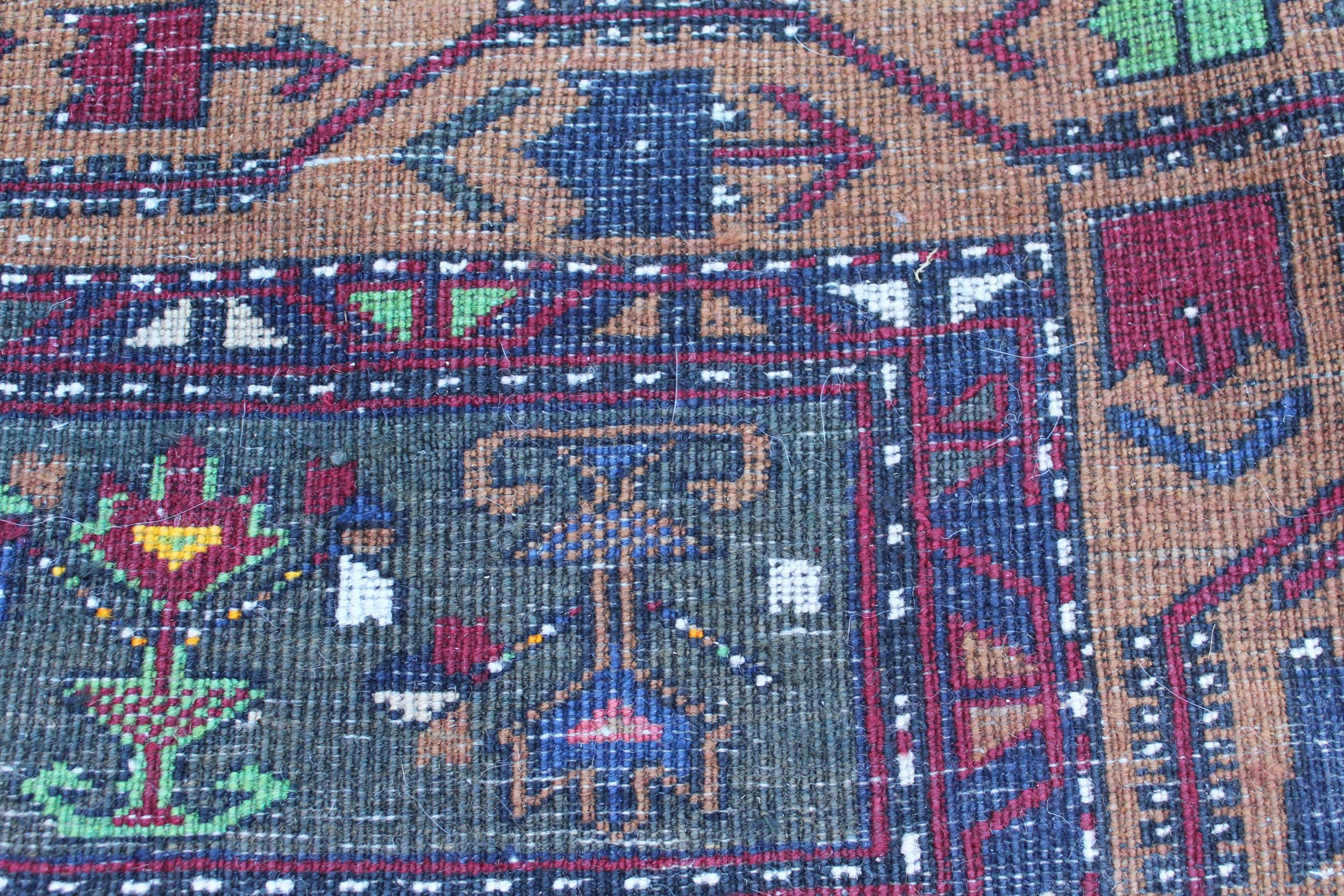 Kurdish rug with centre medallion and all-over floral design on a dark red ground with borders, - Image 3 of 3