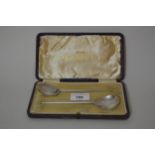 Keswick School of Industrial Arts, cased pair of silver spoons, 6ins long approximately, 1.3oz