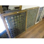Pair of early 20th Century pine framed leaded coloured glass window panels, (both at fault), 43.5ins