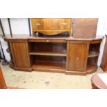 Large reproduction plum pudding mahogany, inverted breakfront sideboard with central shelf,