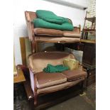 Pair of mid 20th Century French salon sofas, the moulded frames with pink fabric upholstery on