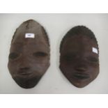 Two native carved wooden masks