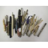 Collection of silver gilt metal and other propelling pencils, fountain pens etc. Two hallmarked