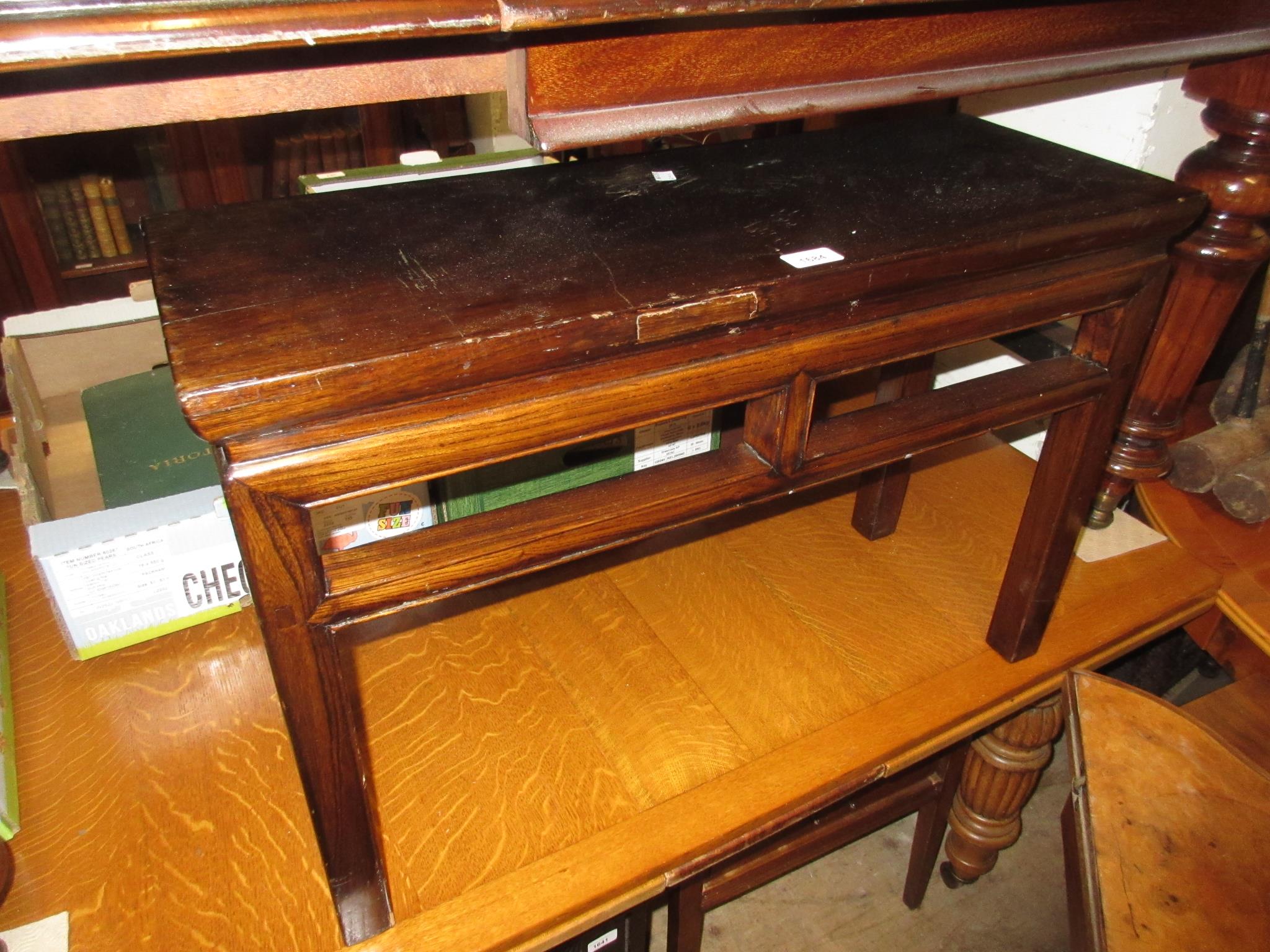 Chinese rectangular elm stool with pierced frieze on square moulded supports, 29.5ins x 11ins x 19.