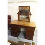 19th Century mahogany dressing table, the rectangular swing mirror above centre drawer flanked by
