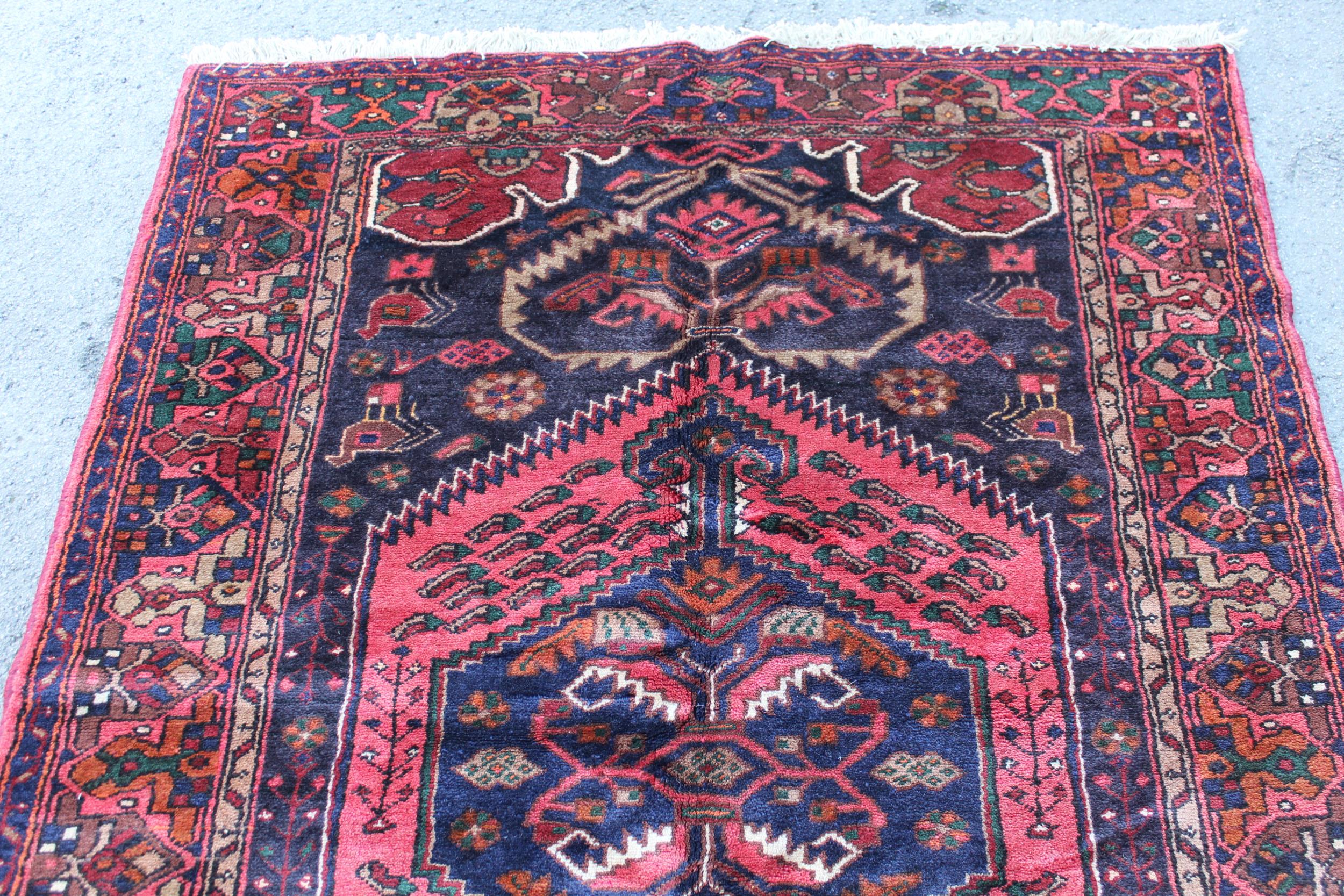 Zanjan rug with a medallion and all-over stylised design on a dark ground with borders, 2.06m x 1.4m - Image 3 of 4