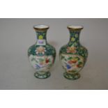 Pair of Chinese enamel decorated baluster form vases (one at fault), 8ins high