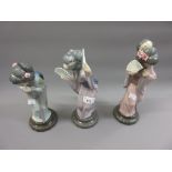 Group of three Lladro porcelain figures of geisha girls, the tallest 11.5ins high