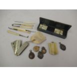 Case set of 19th Century miniature bone and ebony dominoes, together with a quantity of