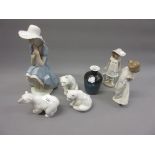 A group of three Lladro figures of polar bears, Lladro baluster form vase and three Nao figures of a