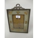 Late 19th / early 20th Century gilt metal photograph frame with laurel wreath surmount, 11ins high