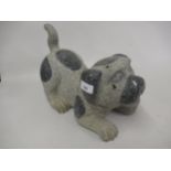 20th Century carved granite figure of a dog of foe, 13.5ins long approximately