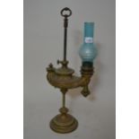Late 19th / Early 20th Century Brass adjustable desk oil lamp on circular base, with later blue