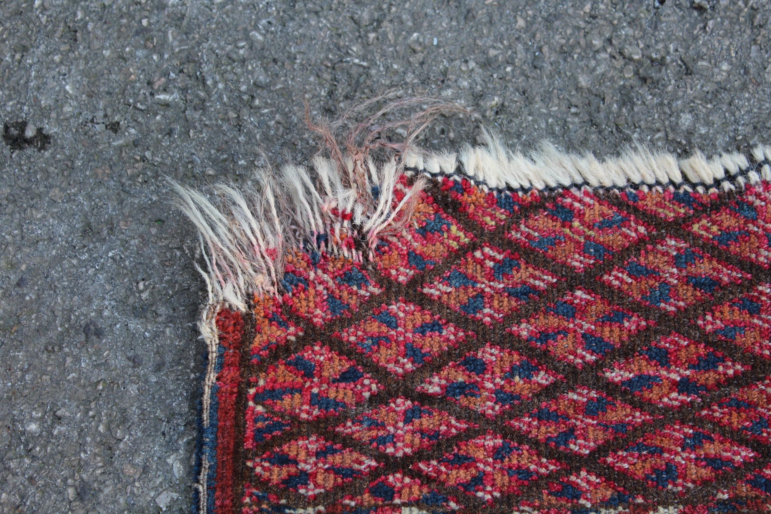 Small Afghan Ersari prayer rug with a wine red ground, 4ft 6ins x 3ft approximately (some wear) - Image 3 of 4