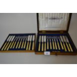 Oak cased set of twelve Victorian silver plated dessert knives and forks with carved ivory handles