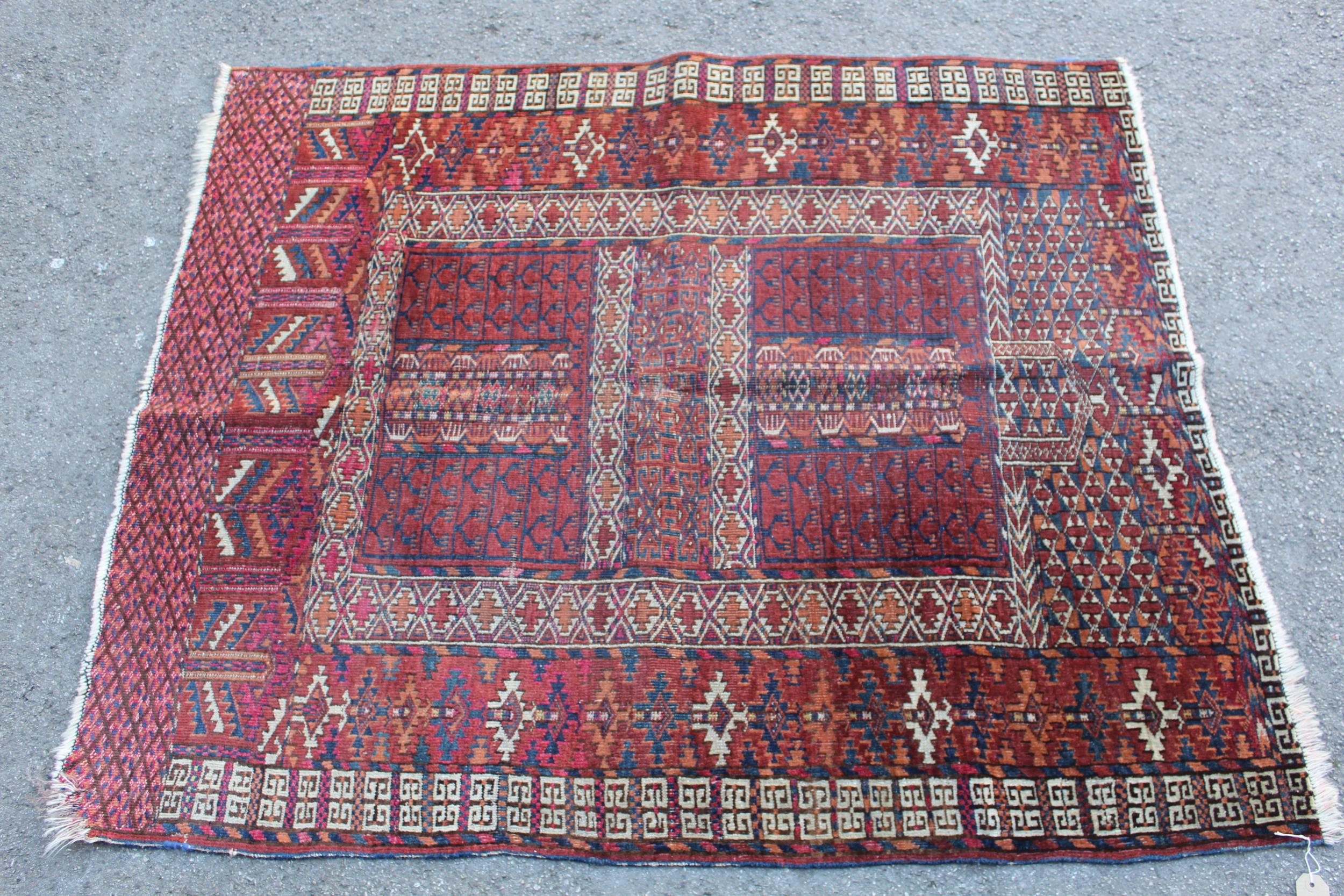 Small Afghan Ersari prayer rug with a wine red ground, 4ft 6ins x 3ft approximately (some wear)