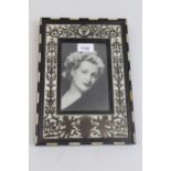 Small 19th Century Italian ebonised and ivory frame housing a photograph of Nelsa Nevard (