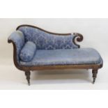 Regency mahogany chaise longue, the frame having reeded scroll work design and blue damask