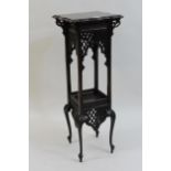 Edwardian mahogany two tier jardiniere stand, the square shaped top and pierced fretwork on cabriole