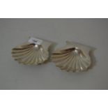 Pair of 20th Century London silver shell shaped butter dishes, 1916, 6 troy oz
