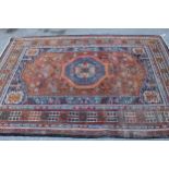 Qashqai rug of central floral medallion and all-over floral design with border, approximately