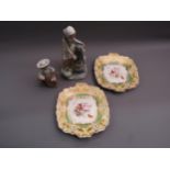 Two Nao figures and a pair of 19th Century English dessert dishes