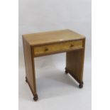 Cotswold school 1930's oak desk with single drawer and bun supports, 13ins high x 28ins wide x 20ins