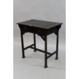 Small Arts and Crafts mahogany writing table with an inset top above a single drawer, raised on