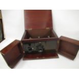 RI & Varley Limited mahogany cased three valve radio, with hinged cover, revealing workings and twin