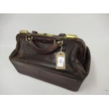 Victorian brown leather Gladstone bag with brass mounts
