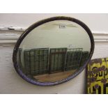 Oval gilt and purple mottled framed mirror with bevelled plate, 15.5ins x 19.5ins