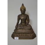 Far Eastern bronze figure of seated Buddha (signs of gilding), 13ins high Gilding worn, otherwise in