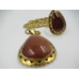 18ct Goldstone pendant and a matching ring, 35g gross