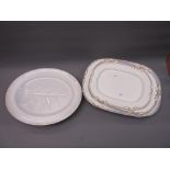 Graduated set of three late 19th / early 20th Century continental meat plates and an oval meat plate