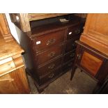 Reproduction mahogany two door television cabinet in the form of a chest of drawers