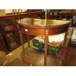 Edwardian mahogany and inlaid demi lune fold-over card table, on square tapering supports (with