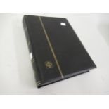 Black stock book containing a large collection of 19th / 20th Century, American stamps