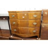 19th Century mahogany bow front chest of three graduated drawers with oval brass handles and splay