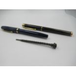 Two Sheaffer fountain pens with 14ct gold nibs, together with a small silver propelling pencil