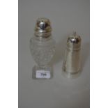 Silver mounted cut glass pedestal sugar shaker together with a silver plated sugar shaker